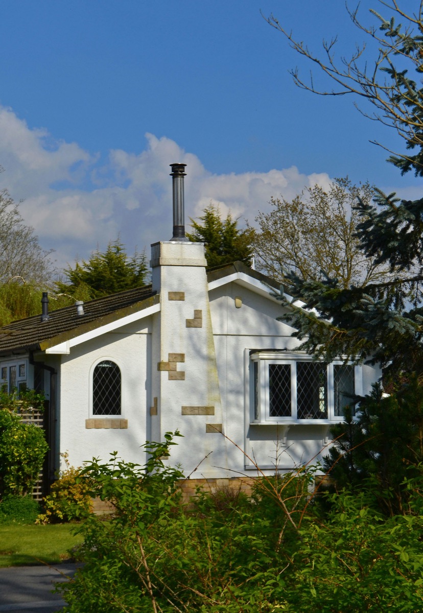 Classic Craftsman bungalow exterior with low-pitched roof and wide porch